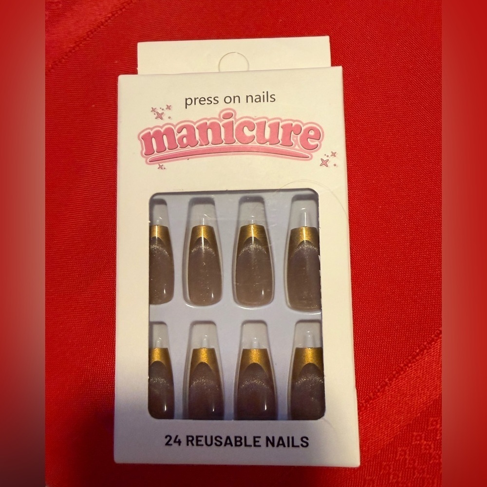 Manicure Gold tip long press on nails with shimmer nude base
